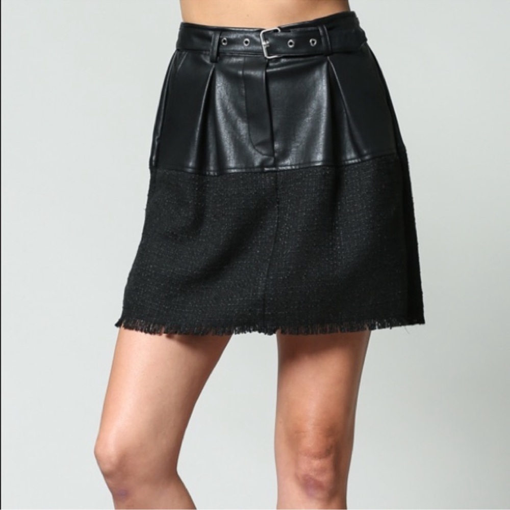 Black buckle mini skirt. Fate designer size small